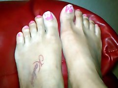Light skinned ebony feet on couch