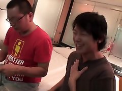Asian in cosplay jacks one cock while riding another