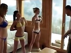 Three girls exercising topless