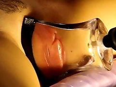 pumped 3suck 1 lips in a tight, flat glass tube