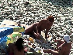 Amateur video of Couple at a shoot pjoto beach nude