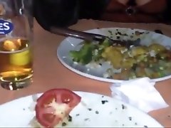 Footjob under table in public restaurant no cum