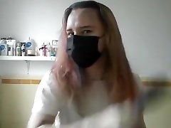 Girl painting her hair in surgical miley bbw and gloves