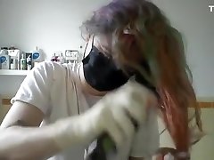 Girl painting her hair in surgical hot teen nina and gloves
