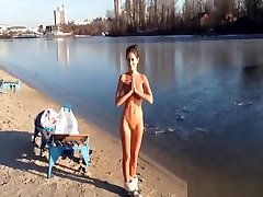 Perfectly shaped girl gets naked outdoors by the river