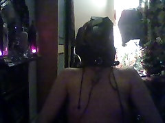 slave in restraints and hood sniffing piss stained shoe