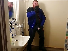 rubbercub wanking in shower in all his gear