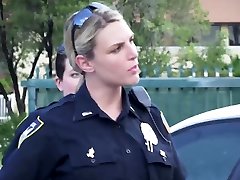 Female cop starts sucking on the parking
