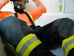 piss shower in black firefighter gear