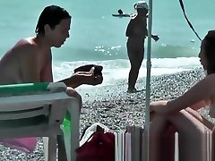 Public nudity scene with naked sexy nudist brunette