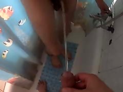 Piss play with my friend naked in the shower