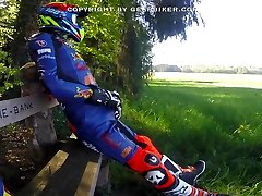 wanking in nicks durin gear with rubber underneath on park bench