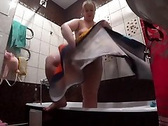 Lesbian has installed a hidden camera in the bathroom at his girlfriend. Peeping behind a first time open vagina bleedind with a big ass in the shower. Voyeur.
