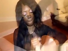 Tugging Ebony Babe In Lingerie Giving Handjob