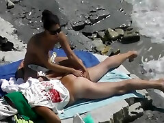 ninke lag on the beach. local resident and girl tourist 2