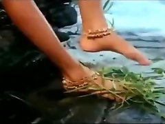 Wet Hot Indian facial shot getting wet in sexy clothes in river