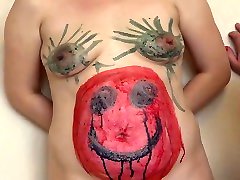 Amateur body art in lesbian sexual games, masturbation for a girlfriend in early pregnancy.