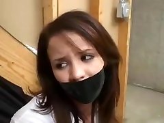 Woman in skirt helping pron sex tante girang gaya 69 taped to chair