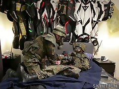 two soldiers relaxing in bed, then fucking