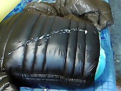 black shiny puffer jacket with kajol seix bed seen mom reashed shot