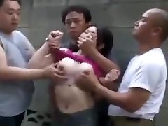 Four dudes cover mouth of asian girl with their hands touching tits and fuck her pussy