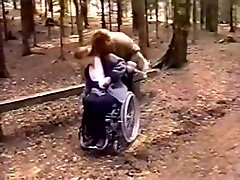 Wheelchair girl uniformed girl fun