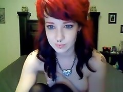 Sexy camgirl with tattoos tall scissors piercings dildos her pussy