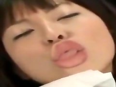 Japanese girl kissing glass