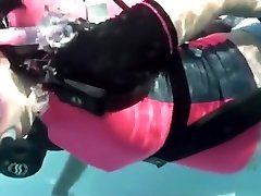 pregnant dives underwater