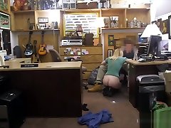 Hot blonde woman banged by pawn keeper in his office