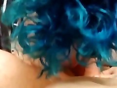 Blue haired hoe sucks dick