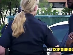 Obnoxious criminal gets his cock sucked and ridden by milf officers