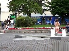 Huge tits slave bath in fountain in downtown