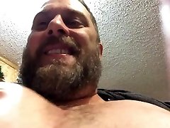 horny fat guy squeezing his big tits