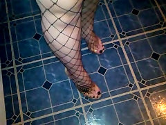 walking in fishnet and heels