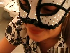 Masked wife blows dick and gets cum in her mouth at gloryhole