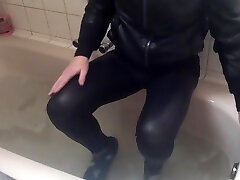 Sexy tight pants ankle boots and heels in bath