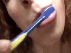 She brushes her teeth with cum after a gangbang