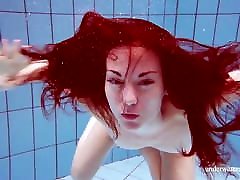 Hot teen Martina swims naked underwater