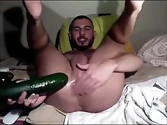 guy stretches out hole with cucumber on cam