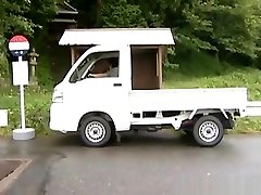Japanese milf is fucked on a truck