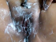 Smoking garden waters shaves her beautiful wet pussy