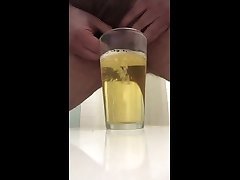 part 1 of 2 of piss and cum in a glass.