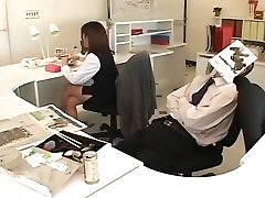 Japanese business cuye blonde likes to handjob in office
