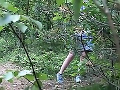 busty blonde teen pissing in forest