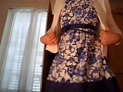 Amateur cross dresser wearing a cute secretary flower dress