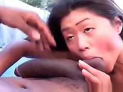 Horny Asian gives head to enormous husband wife and son threesome cock