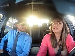 Busty young chick Ella Knox gives a blowjob in the car and gets fucked indoor
