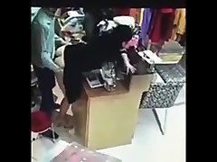 Boss has seachwifeys world cliporn with employee behind cash register in China