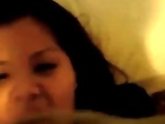 Asian slut sucks and receives cum on her face